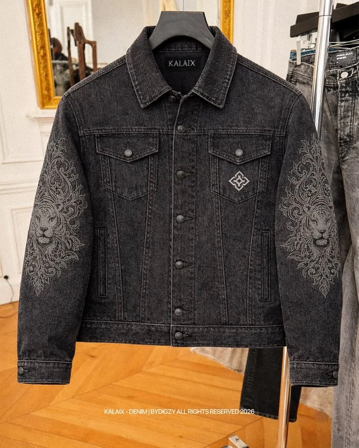 Kalaix black denim jacket with embroidered lion sleeves, designed by Digzy